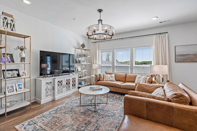 1246 June Wilde Rdg, Spring Hill, TN 37174 - living room featuring a chandelier, wood finished floors, and recessed lighting