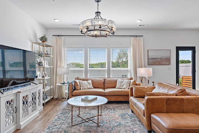 1246 June Wilde Rdg, Spring Hill, TN 37174 - living area with a chandelier, healthy amount of natural light, light wood-type flooring, and recessed lighting