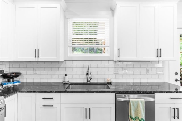 500 Beck Ave, Chattanooga, TN 37405 - kitchen featuring stainless steel dishwasher, decorative backsplash, white cabinetry, and dark stone counters