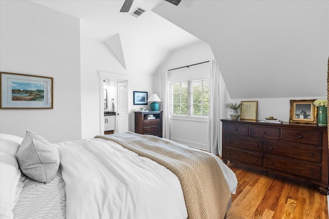 500 Beck Ave, Chattanooga, TN 37405 - bedroom with lofted ceiling, wood finished floors, ensuite bath, and a ceiling fan
