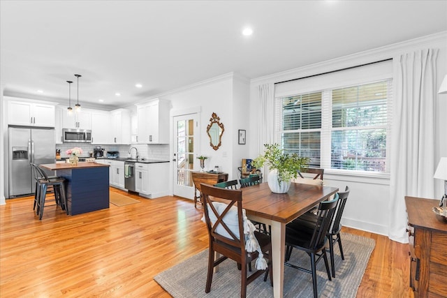 500 Beck Ave, Chattanooga, TN 37405 - dining area featuring plenty of natural light, ornamental molding, light wood-type flooring, and recessed lighting