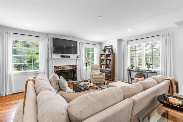 500 Beck Ave, Chattanooga, TN 37405 - living area with a brick fireplace, light wood-style flooring, and recessed lighting