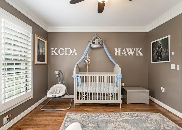 1205 Sequoya Trl, Columbia, TN 38401 - bedroom with a nursery area, wood finished floors, ornamental molding, and a ceiling fan