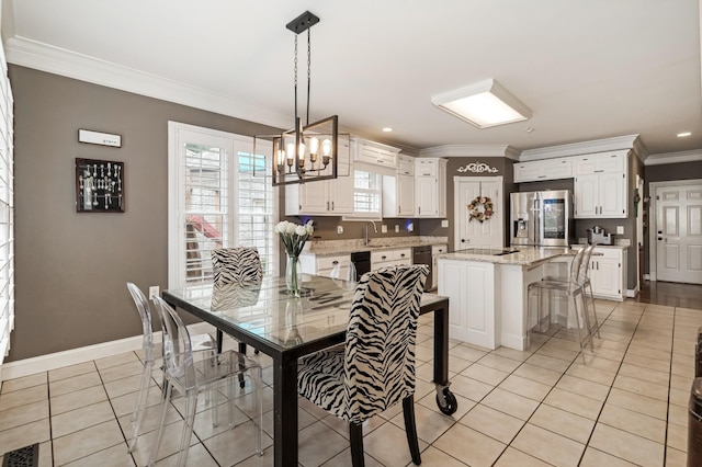1205 Sequoya Trl, Columbia, TN 38401 - dining space with ornamental molding, light tile patterned floors, a chandelier, and recessed lighting