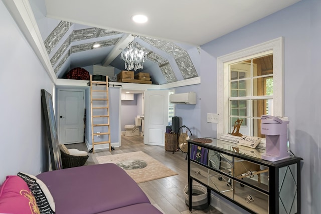 1205 Sequoya Trl, Columbia, TN 38401 - living area featuring a chandelier, an AC wall unit, wood finished floors, a barn door, and recessed lighting