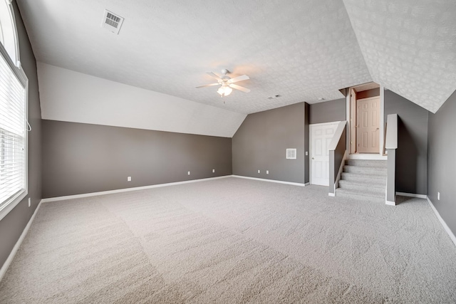 122 Belmont Cir, Hendersonville, TN 37075 - bonus room with baseboards, lofted ceiling, light colored carpet, ceiling fan, and healthy amount of natural light