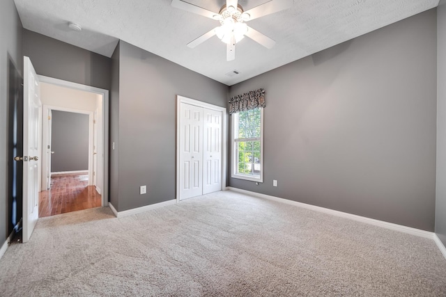 122 Belmont Cir, Hendersonville, TN 37075 - unfurnished bedroom featuring carpet, baseboards, a closet, and ceiling fan