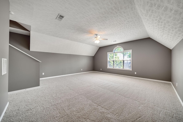 122 Belmont Cir, Hendersonville, TN 37075 - additional living space featuring a ceiling fan, baseboards, carpet flooring, lofted ceiling, and a textured ceiling