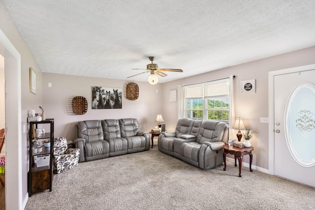 3970 Pleasant Grove Rd, White House, TN 37188 - carpeted living area featuring a textured ceiling, ceiling fan, and baseboards