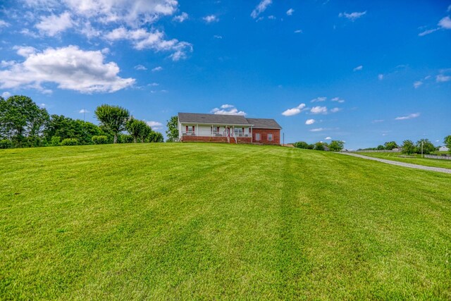 3970 Pleasant Grove Rd, White House, TN 37188 - view of front of house with a front yard