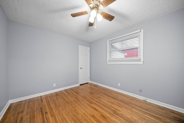 101 Charlemagne Blvd, Clarksville, TN 37042 - unfurnished room featuring baseboards, a textured ceiling, wood finished floors, and ceiling fan