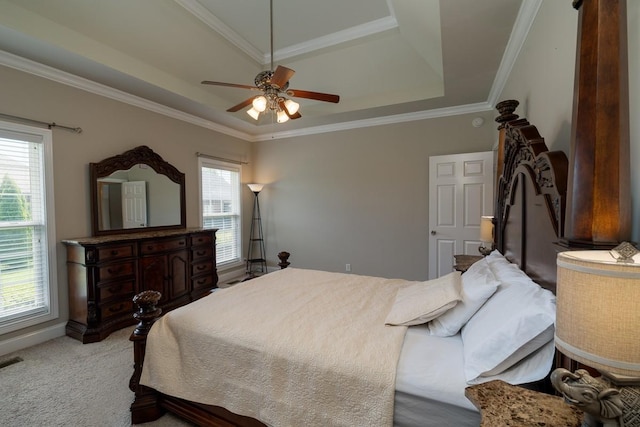 2317 Saint Andrews Dr, Murfreesboro, TN 37128 - carpeted bedroom with a tray ceiling, multiple windows, ornamental molding, and ceiling fan