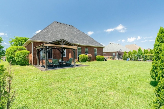 2317 Saint Andrews Dr, Murfreesboro, TN 37128 - back of house featuring a gazebo, a playground, brick siding, a lawn, and a patio