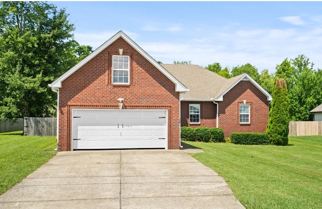 324 Airport Rd, Portland, TN 37148 - traditional home featuring brick siding, a garage, and driveway
