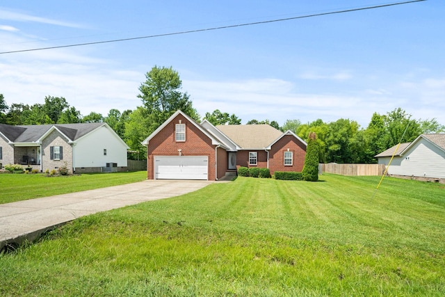 324 Airport Rd, Portland, TN 37148 - ranch-style house with brick siding, concrete driveway, and a garage