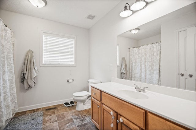 324 Airport Rd, Portland, TN 37148 - bathroom with vanity, baseboards, toilet, and stone finish floors