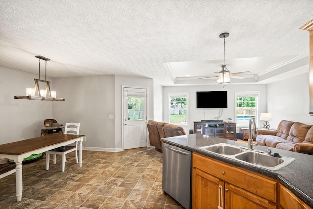324 Airport Rd, Portland, TN 37148 - kitchen with dishwasher, a sink, dark countertops, brown cabinets, and open floor plan