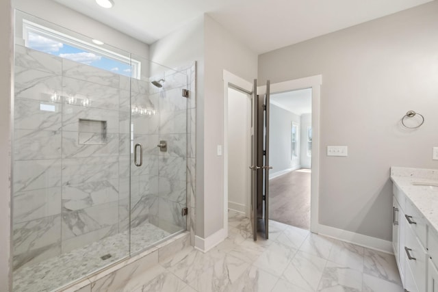 2200 Hamilton Chambers Rd, Lebanon, TN 37087 - bathroom with a stall shower, vanity, baseboards, and marble finish flooring
