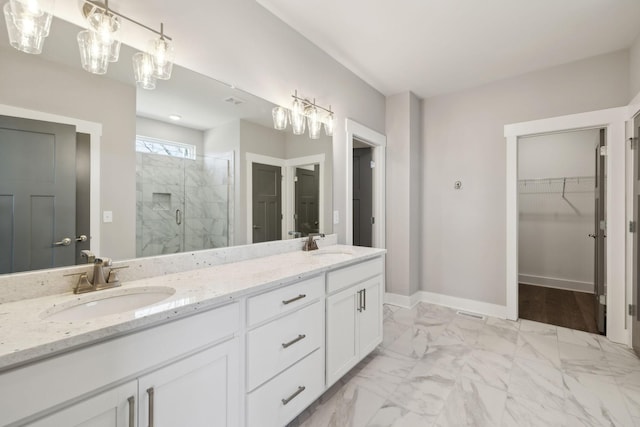 2200 Hamilton Chambers Rd, Lebanon, TN 37087 - full bath featuring a stall shower, double vanity, a spacious closet, marble finish flooring, and baseboards