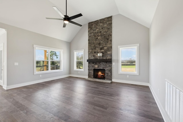 2200 Hamilton Chambers Rd, Lebanon, TN 37087 - unfurnished living room featuring a ceiling fan, dark wood-style floors, plenty of natural light, high vaulted ceiling, and a fireplace