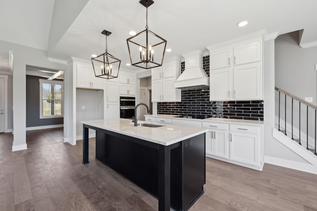 2200 Hamilton Chambers Rd, Lebanon, TN 37087 - kitchen with a sink, custom exhaust hood, black appliances, white cabinets, and crown molding