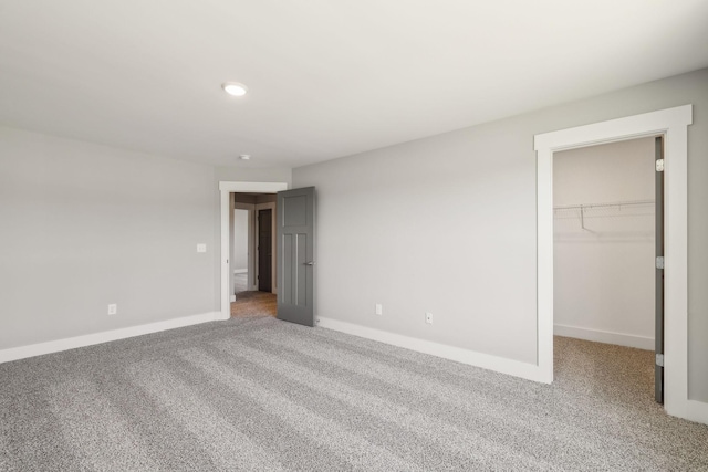 2200 Hamilton Chambers Rd, Lebanon, TN 37087 - unfurnished bedroom featuring carpet flooring, baseboards, a walk in closet, a closet, and recessed lighting
