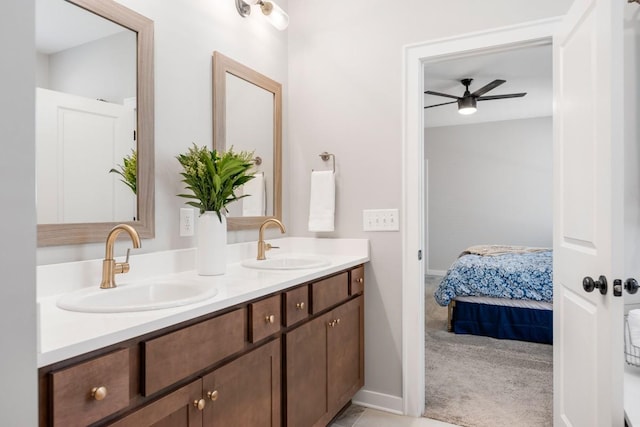 883 Plowson Rd, Mount Juliet, TN 37122 - bathroom with double vanity, ceiling fan, ensuite bathroom, and baseboards