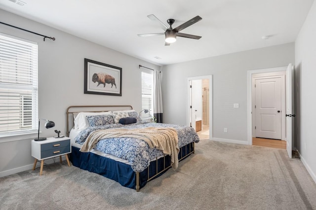 883 Plowson Rd, Mount Juliet, TN 37122 - bedroom featuring carpet flooring, baseboards, ceiling fan, and connected bathroom