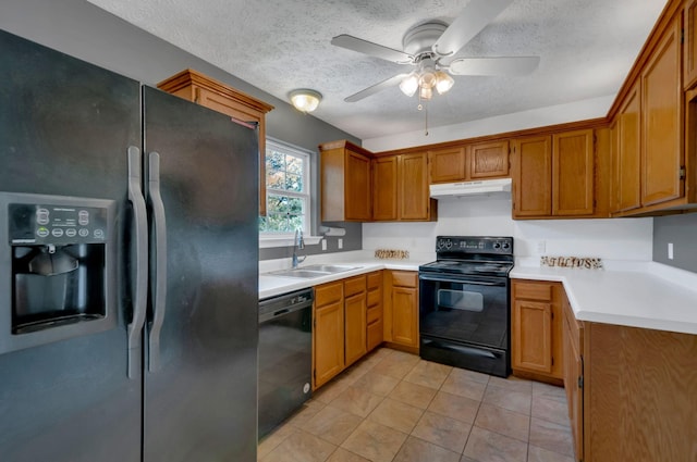 7108 Gregory Ct, Fairview, TN 37062 - kitchen with black appliances, a sink, under cabinet range hood, ceiling fan, and light countertops