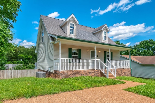 7108 Gregory Ct, Fairview, TN 37062 - view of front of home featuring a porch, roof with shingles, and cooling unit