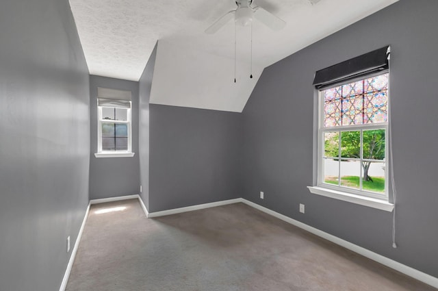 7108 Gregory Ct, Fairview, TN 37062 - bonus room with baseboards, carpet flooring, a ceiling fan, a textured ceiling, and lofted ceiling