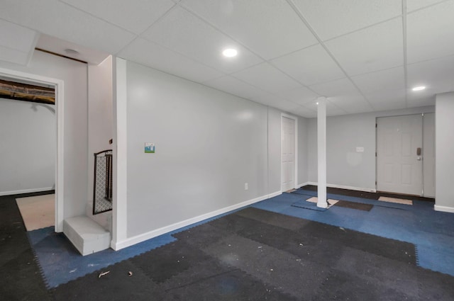 7108 Gregory Ct, Fairview, TN 37062 - finished below grade area with baseboards, a drop ceiling, and rubber floors