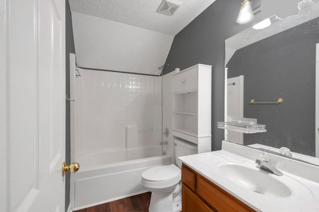 7108 Gregory Ct, Fairview, TN 37062 - bathroom with lofted ceiling, tub / shower combination, wood finished floors, vanity, and toilet