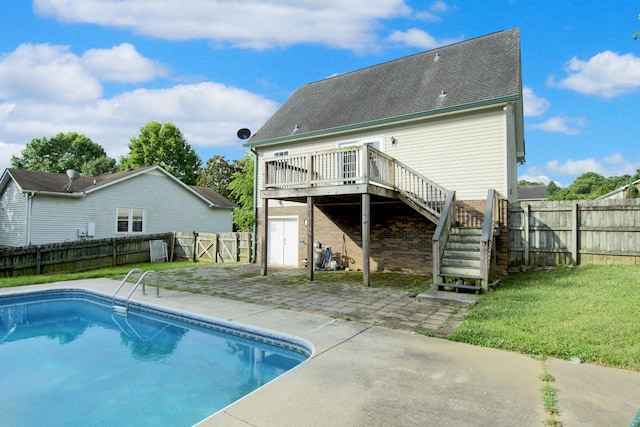 7108 Gregory Ct, Fairview, TN 37062 - rear view of property with stairway, a fenced backyard, a wooden deck, a patio, and roof with shingles