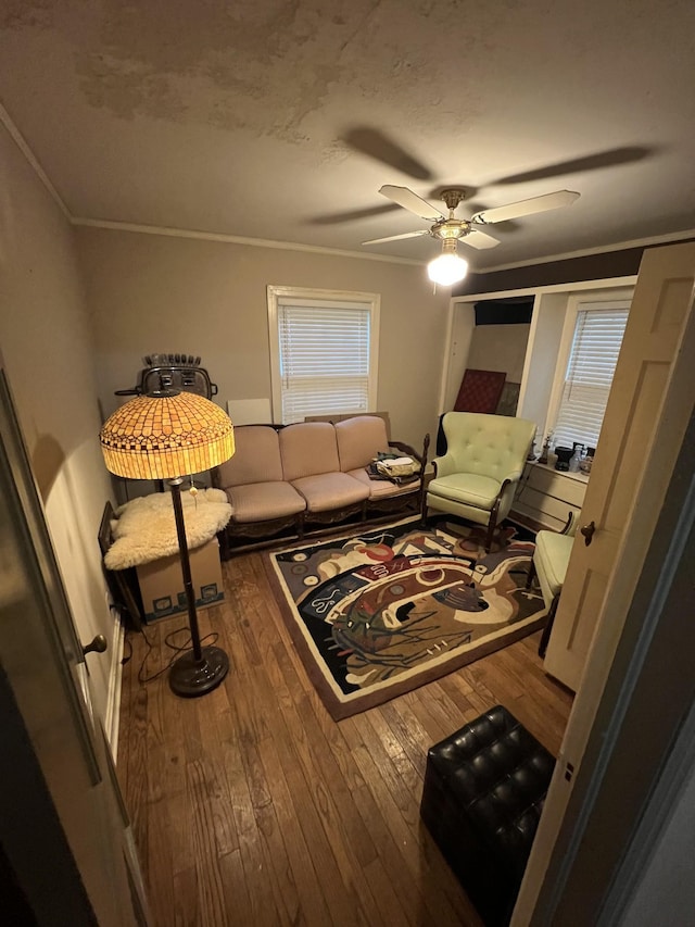 1802 Glen Oaks Ln, Dyersburg, TN 38024 - living room with hardwood / wood-style floors, ceiling fan, and ornamental molding