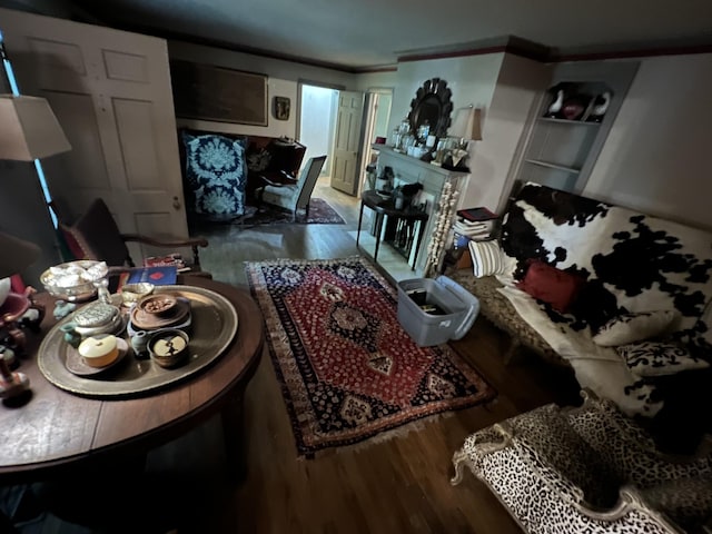 1802 Glen Oaks Ln, Dyersburg, TN 38024 - living area with wood finished floors and a fireplace