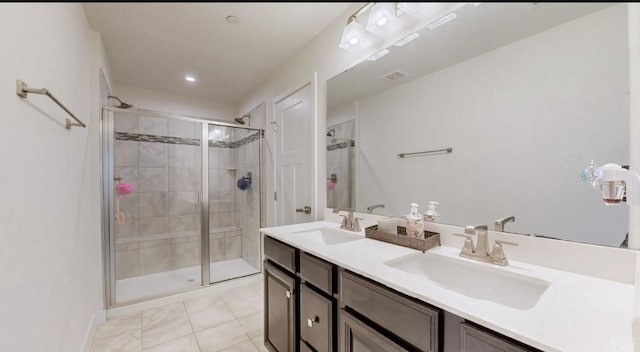 130 Keelon Gap Rd, Spring Hill, TN 37174 - bathroom with a shower stall, double vanity, and recessed lighting