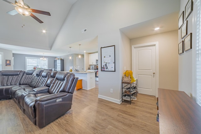 82 Pinnacle Point Ln, Tullahoma, TN 37388 - living area with light wood-type flooring, a chandelier, a ceiling fan, recessed lighting, and baseboards