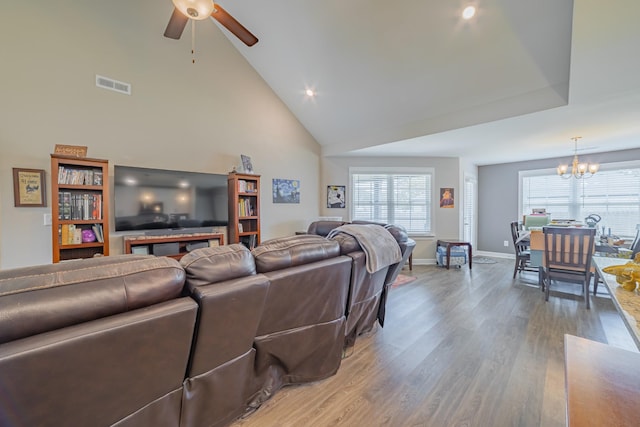82 Pinnacle Point Ln, Tullahoma, TN 37388 - living area featuring a chandelier, a ceiling fan, light wood-style flooring, plenty of natural light, and high vaulted ceiling