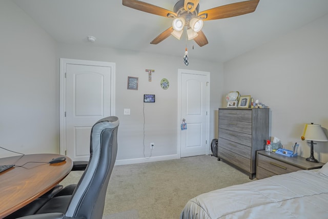 82 Pinnacle Point Ln, Tullahoma, TN 37388 - bedroom with light carpet, a desk, baseboards, and a ceiling fan