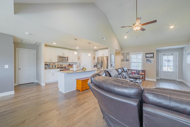 82 Pinnacle Point Ln, Tullahoma, TN 37388 - living area with ceiling fan, light wood-style flooring, high vaulted ceiling, recessed lighting, and baseboards
