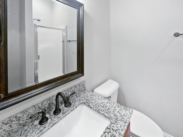 137 Dean St, Pleasant View, TN 37146 - bathroom featuring toilet, a stall shower, and vanity