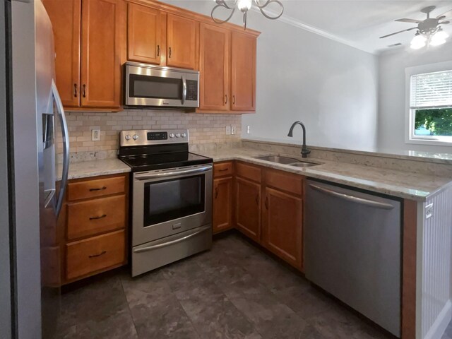 137 Dean St, Pleasant View, TN 37146 - kitchen with appliances with stainless steel finishes, a sink, backsplash, brown cabinets, and ornamental molding
