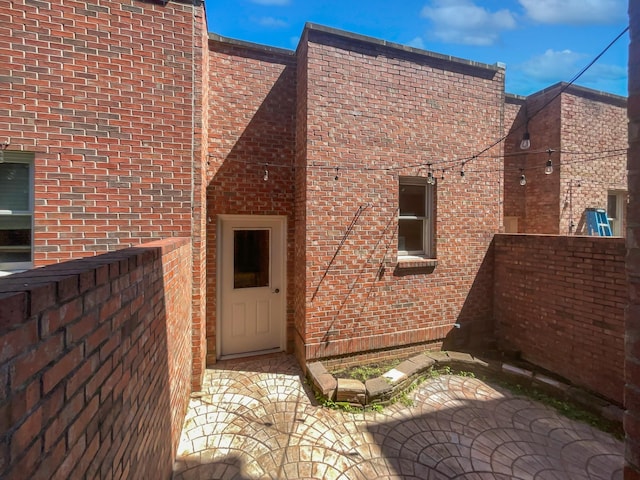 137 Dean St, Pleasant View, TN 37146 - view of exterior entry featuring brick siding
