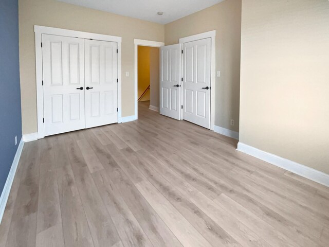 137 Dean St, Pleasant View, TN 37146 - unfurnished bedroom featuring light wood-style flooring and baseboards