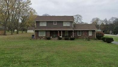 191 Green Harbor Rd, Old Hickory, TN 37138 - view of front facade featuring a porch and a front lawn