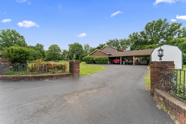 191 Green Harbor Rd, Old Hickory, TN 37138 - view of front of property featuring covered parking and a chimney