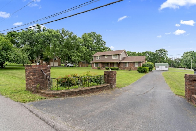 191 Green Harbor Rd, Old Hickory, TN 37138 - colonial home featuring a front lawn, brick siding, and a detached garage