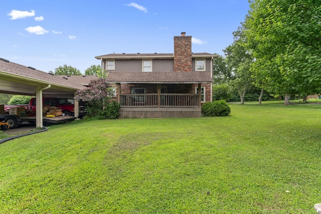 191 Green Harbor Rd, Old Hickory, TN 37138 - back of house featuring a lawn, a chimney, and brick siding
