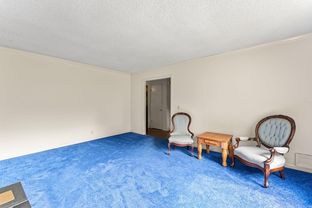 191 Green Harbor Rd, Old Hickory, TN 37138 - sitting room with carpet floors, a textured ceiling, and crown molding